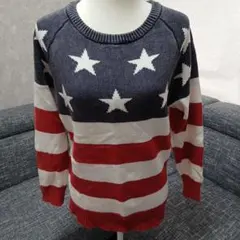 ロデオクラウンズ 星柄デザインの長袖ニットセーターダメージ加工