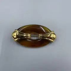 048 ブラウン オーバル型 ブローチ 金属装飾付き