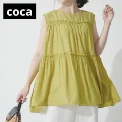 [coca] サテンティアードトップスサテン 黄　韓国　フェミニン　体型カバー