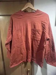 オレンジ 長袖カットソー ポケット付き