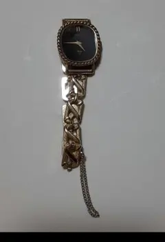 SEIKOのブレスウォッチですゴールド クォーツ腕時計 黒文字盤
