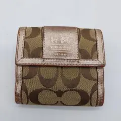 COACH 二つ折り財布　シグネチャーキャンバス