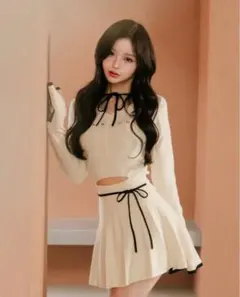 darich ウエストオープンリボンデザインニットミニワンピース　アイボリー