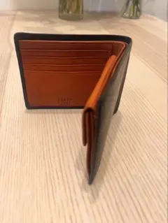 TAKEO KIKUCHI 二つ折り財布 オレンジ/ブラック