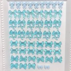 【残り1点】ネイルパーツ　ブルーリボン　クリア　青　水色　ミニ　春夏　デコ