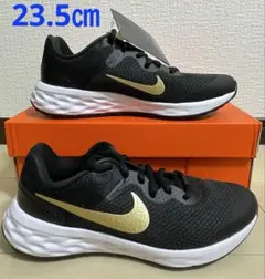 ①新品ナイキNIKE☆レボリューション23.5㎝ブラックメタリックゴールド002