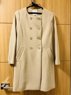 ベージュ ダブルボタンコート リボン付き