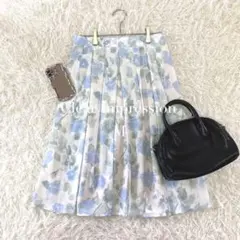 クリアインプレッション/フレアスカートタックM花柄春夏フェミニン白ブルー☘️のサムネイル