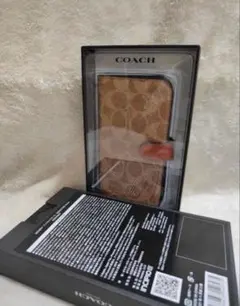 R49)COACH iPhone 15plus手帳型ケース - メルカリ