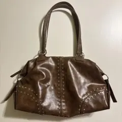 スタッズ付きブラウンハンドバッグのサムネイル