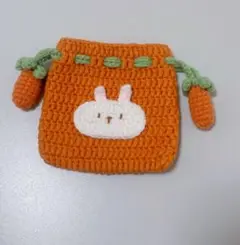 うさぎの顔のオレンジ巾着袋