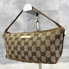 美品 グッチ キャンバス アクセサリーポーチ GG柄 ロゴ型押し ファスナー 茶