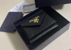 PRADA 三つ折財布 ブラック ゴールドのサムネイル