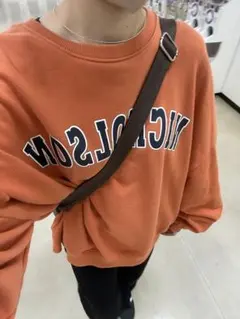 オレンジ プリント スウェット