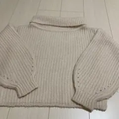 ダズリンのベージュ リブ編み ハイネックセーター