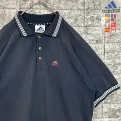 【90s万国旗タグ】オールドアディダス 刺繍 襟ライン 半袖 ポロシャツ 古着のサムネイル