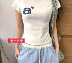 aeae Tシャツ ホワイト トップス カットソー 韓国 ロゴ ハート