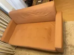ピンクの2人掛けソファ