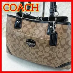 COACH ロゴ入り ベージュ ハンドバッグ　がま口