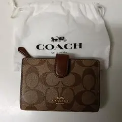 COACH シグネチャー 二つ折り財布のサムネイル