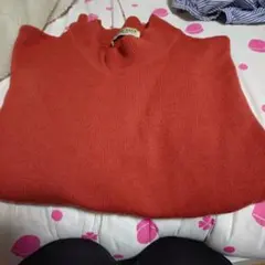 オレンジ ハイネック ニット 長袖