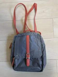 【未使用】MICHL KLEIN グレーとオレンジのリュックのサムネイル