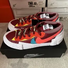 KAWS × sacai × Nike Blazer Low