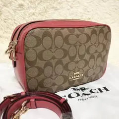 美品＊ COACH カメラバッグ クロスボディ シグネチャー ローズピンク