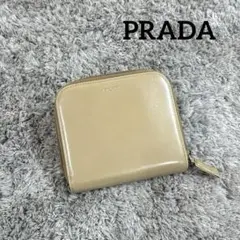 PRADA プラダ 二つ折り財布 レザー ベージュ ラウンドファスナー