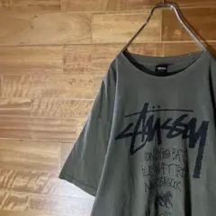 ステューシー　Tシャツ　カーキー　ロゴプリント　オリーブ　ライオン　L〜XL程