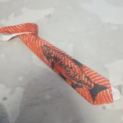 Communication Neck オレンジ. サーモン柄ネクタイ