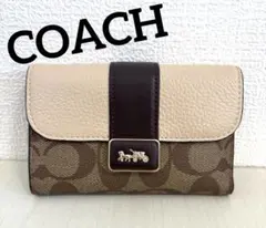 COACH コーチ 三つ折り財布 馬車金具 シグネチャー柄 ブラウン×ベージュ