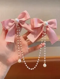 上品なピンクのリボンとパールチェーンのヘアクリップ