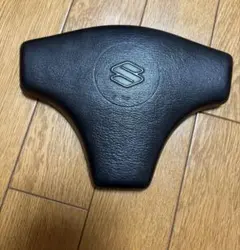 スズキ 純正　カプチーノ用　ステアリングホイールホーンボタンカバー 黒のサムネイル