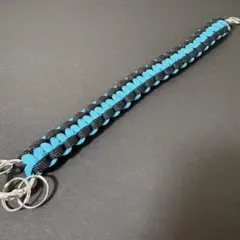 パラコード ロングキーリング（黒×ターコイズブルー／全長約26cm）のサムネイル