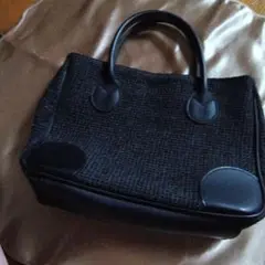 Mono COMME CA 黒の合成繊維とレザーのハンドバッグ