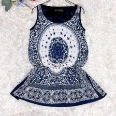 【セシルマクビー】総柄 ノースリーブ トップス(M)ペプラム