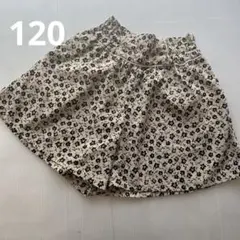 クリーム色と黒の花柄ハーフパンツ120