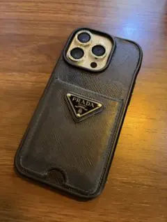 PRADA iPhone14Pro ケース サフィアーノレザー ライトブルー - メルカリ