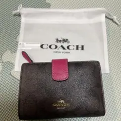 COACH 二つ折り財布 シグネチャー ピンク
