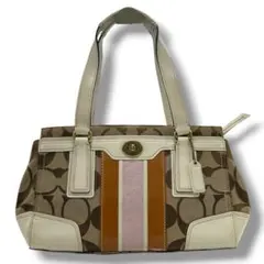 COACH signature hanbag brown turnlok y2k - メルカリ