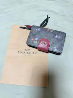 COACH 三つ折り財布 チェリー柄 ブルー - メルカリ