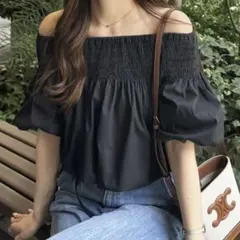 【ZOZOTOWN/nelliy.】オフショルドロストシャーリングシャツブラウスのサムネイル