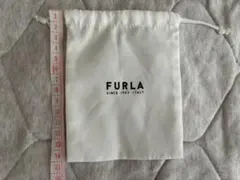 FURLA 巾着袋 ホワイト ロゴ入りのサムネイル