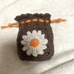 【匿名配送】ぷっくりお花　巾着ポーチ　小物入れ　編み物　ハンドメイド　かぎ編み