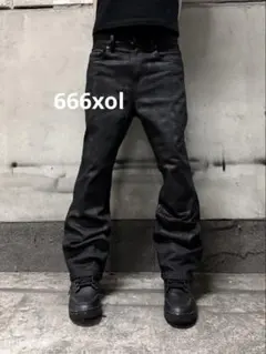 WAX COATED FLARE DENIM PANTS