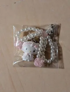 サンリオキャラクターズ　シークレットストラップ　ホワイトフリル　チャーミーキティ