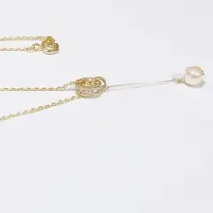 クリスタルリングとパールのネックレス