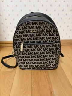 値下げ可 MICHAEL KORS MK柄 リュック 黒 - メルカリ