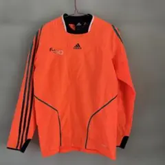 adidas F50 ピステ・ウィンドブレーカー オレンジ
